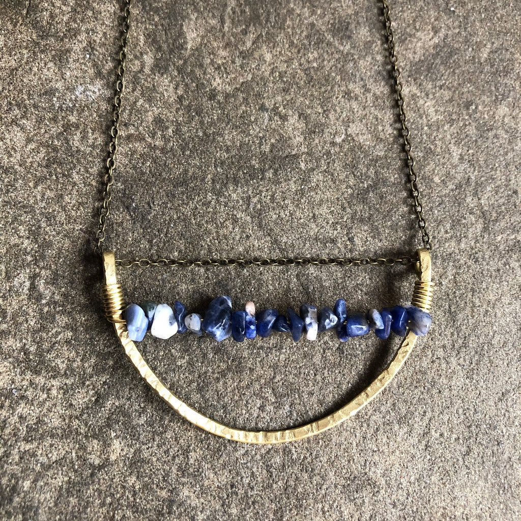 Arc of Brass with Sodalite Crystal
