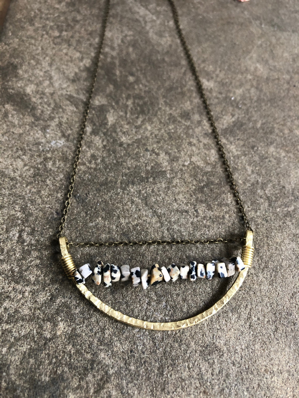 Arc of Brass with Dalmatian Jasper Crystal