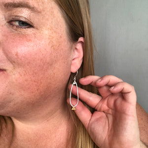 Silver pods with Brass Triangles